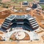 Aerial shot of modern construction in Bangalore, showcasing architectural innovation.