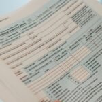 Detailed close-up image of a U.S. 1040 Individual Income Tax Return form, ideal for finance-related content.