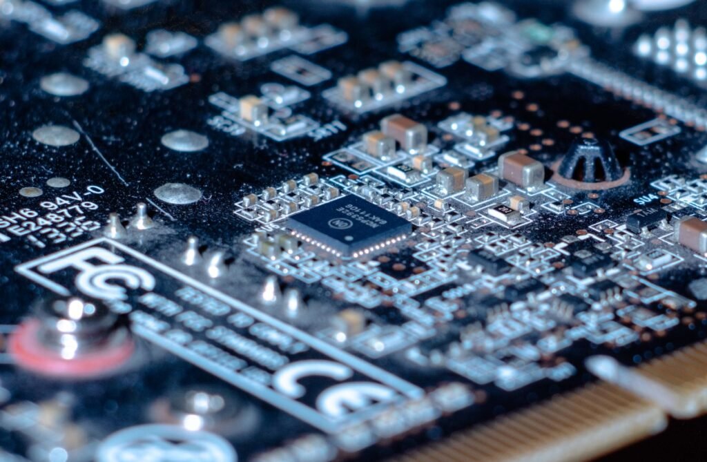 Detailed close-up of a computer circuit board showcasing components and intricate connections.