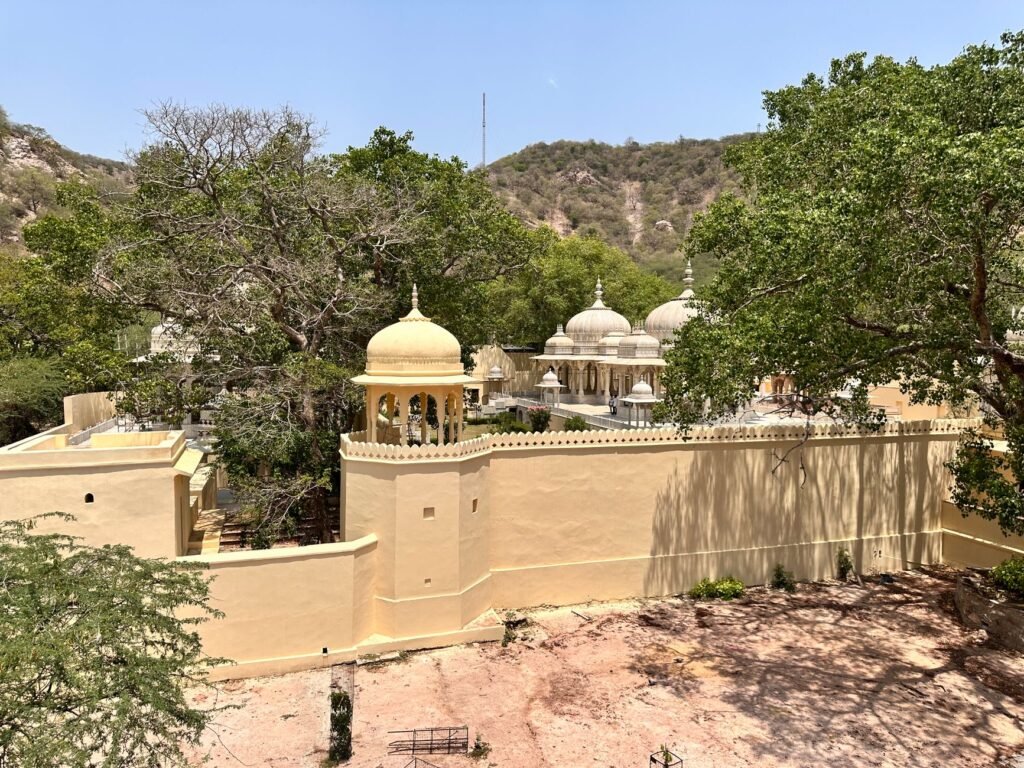 Aerial view of the iconic Panna Meena Ka Kund with traditional architecture and lush greenery in Jaipur, Rajasthan.