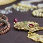 Stunning close-up of intricately designed gold and beaded jewelry showcasing traditional craftsmanship.