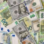 A detailed collage of Euro and Dollar banknotes showcasing international currency exchange.