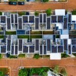 Drone shot of an organized residential area in Banten, Indonesia with solar panels.