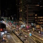 Vibrant night view of bustling Paulista Avenue in São Paulo, Brazil, showcasing the city's dynamic architecture.