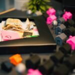 Real estate investment concept with money and house models on table.