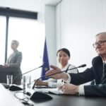 Panelists at an EU conference discussing law and diplomacy.